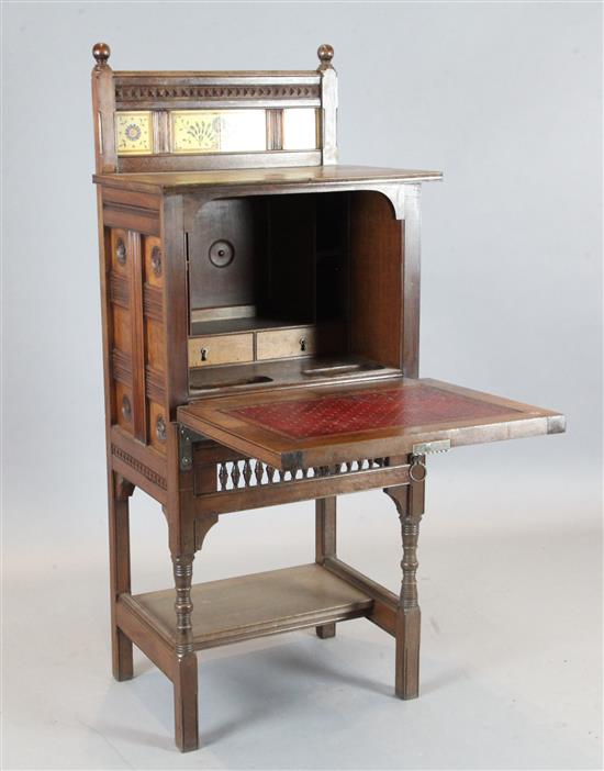 Attributed to Charles Lock Eastlake. A Victorian Aesthetic movement walnut writing desk, W.2ft D.1ft 6in. H.4ft 9in.